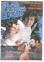 Silahın Elinde Kardeş